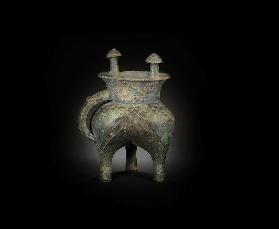 A rare archaic bronze ritual inscribed tripod wine vessel, jia Late Shang/early Western Zhou Dynasty, 12th-11th century BC