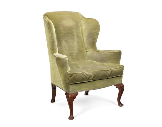 A late 19th/early 20th century walnut wingback armchair in the George II style image 1
