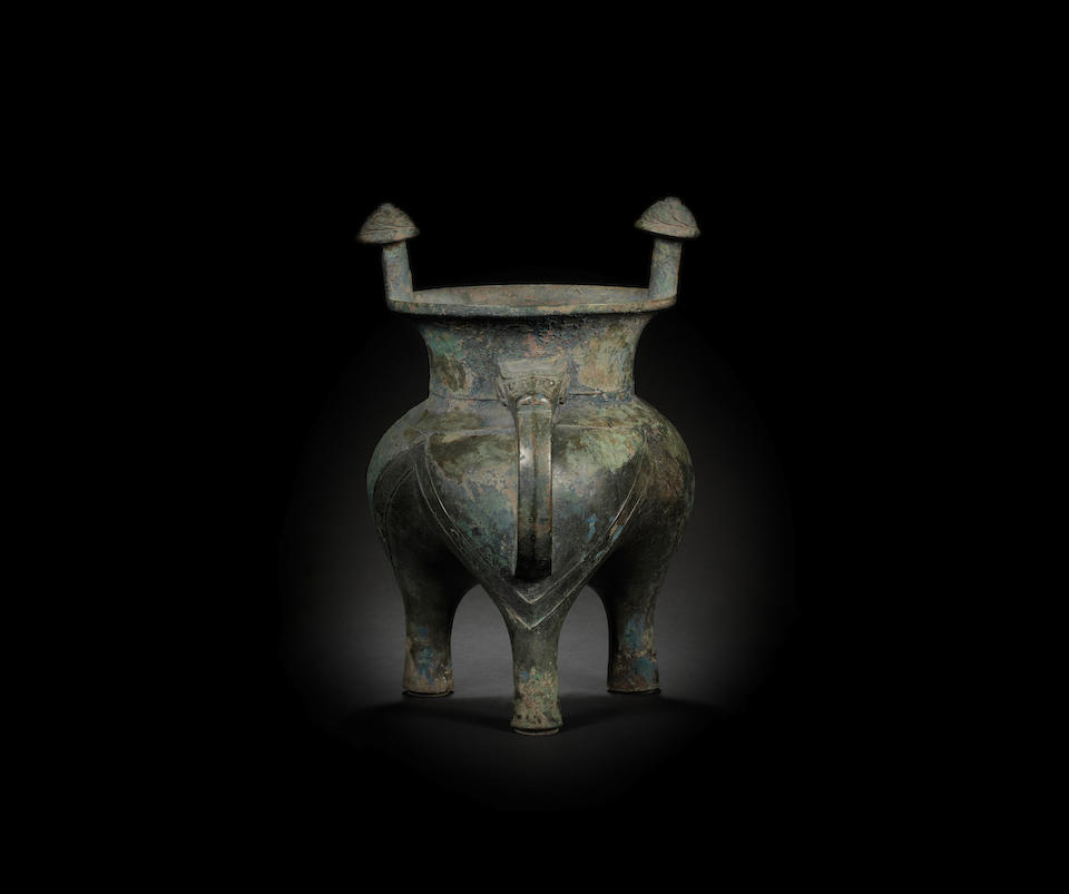 A rare archaic bronze ritual inscribed tripod wine vessel, jia Late Shang/early Western Zhou Dynasty, 12th-11th century BC