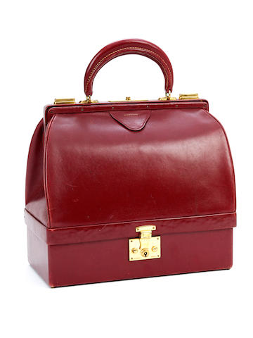 Bonhams : HERMÈS: A rouge box leather 'Sac Mallette' handbag circa 1960