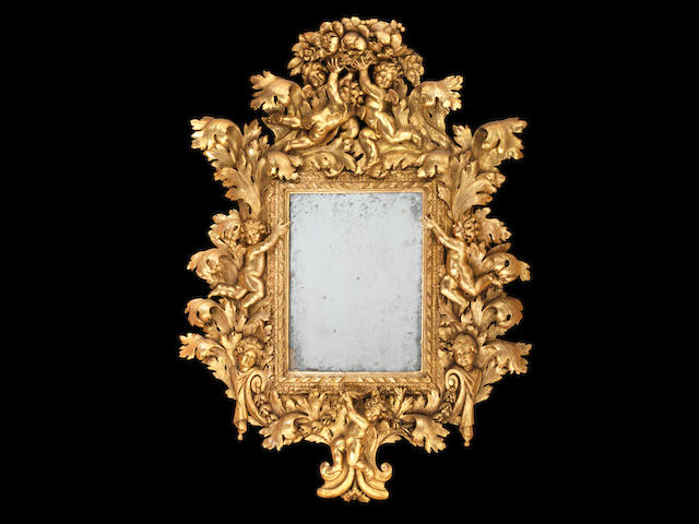 An impressive Italian late 17th century giltwood mirror