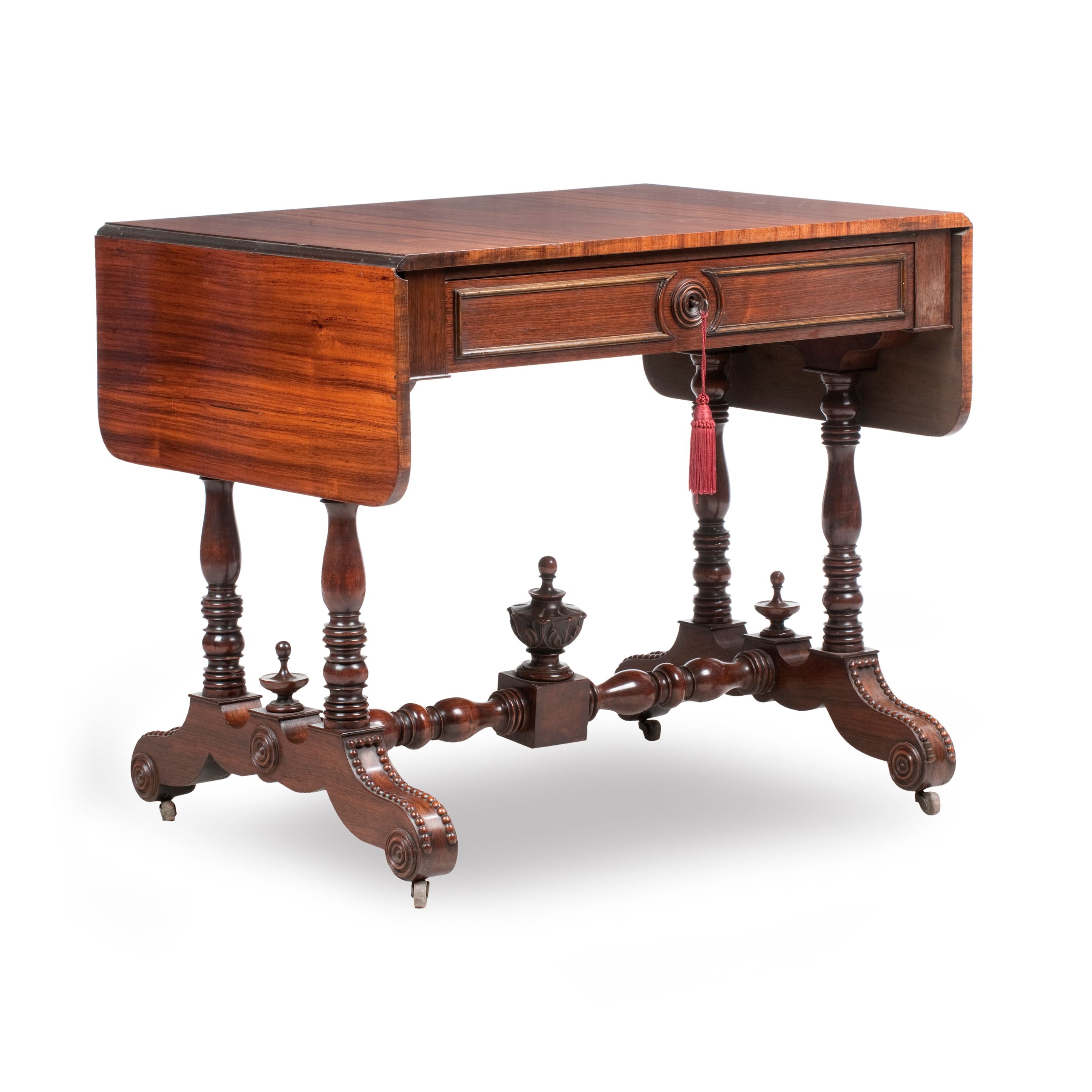 A MID-19TH CENTURY PADOUK SOFA TABLE
