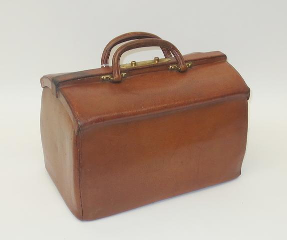 Bonhams : A leather Gladstone-type bag by Louis Vuitton, circa 1910,