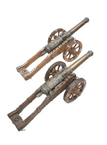 A Pair Of Small Bronze Field Guns