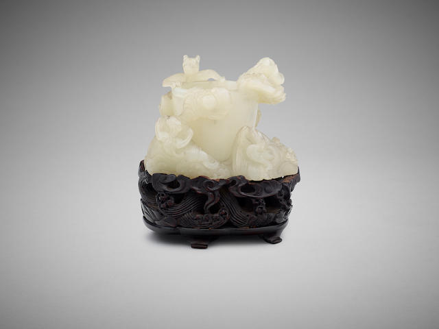 A Chinese carved white jade libation cup Qing dynasty