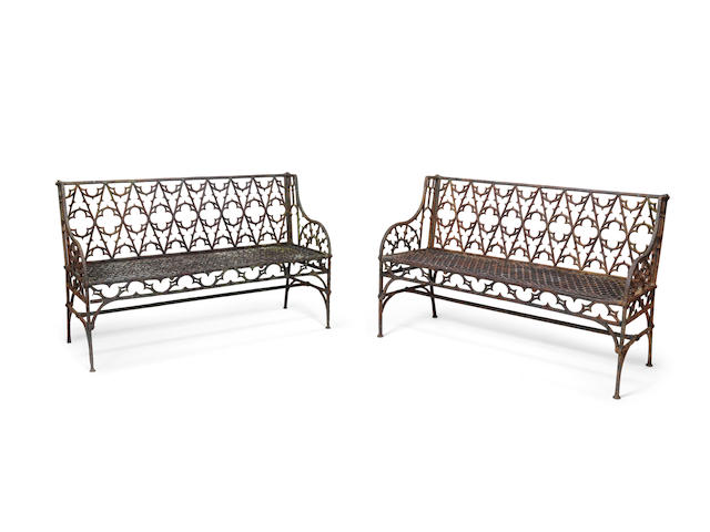 A pair of French mid 19th century cast iron garden benches probably made by the Val d'Osne foundry (2)