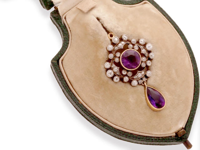 An early 20th century amethyst and diamond pendant/brooch