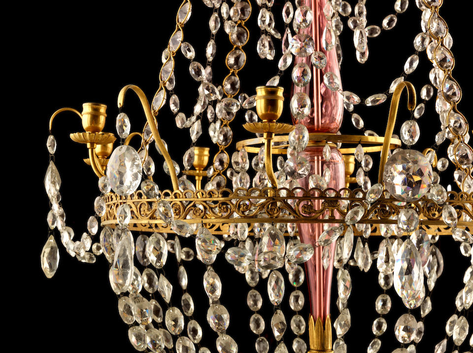 An early 19th century Swedish gilt bronze and pink and clear cut glass eight light chandelier  in the Gustavian manner