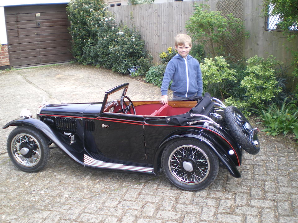 A '1933 Alvis Speed 20' child's car,