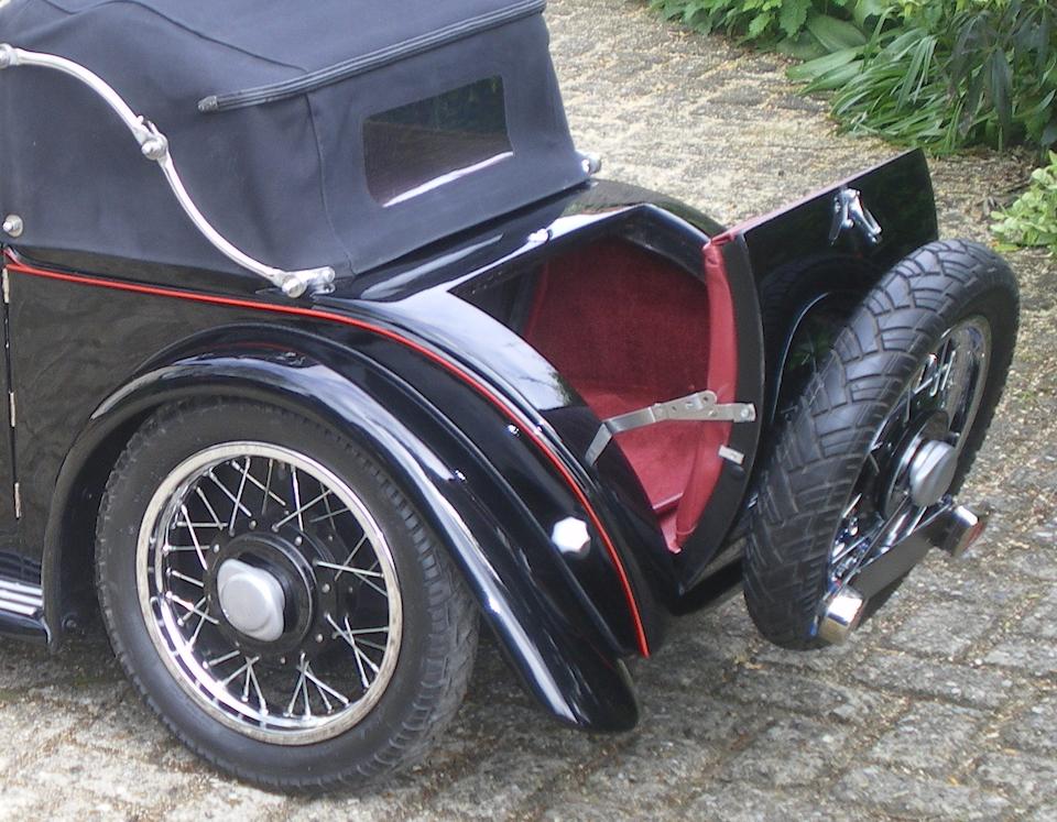 A '1933 Alvis Speed 20' child's car,
