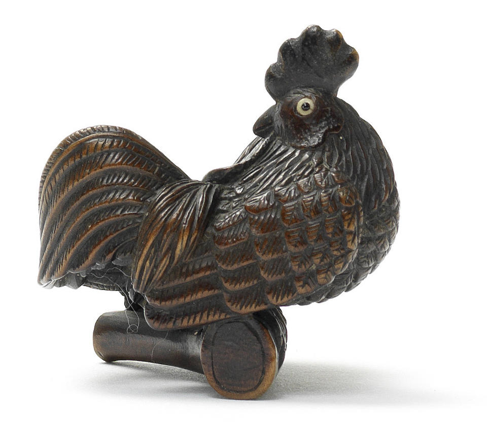 A wood netsuke of a cockerel and hen  By Nobuyuki, 19th century
