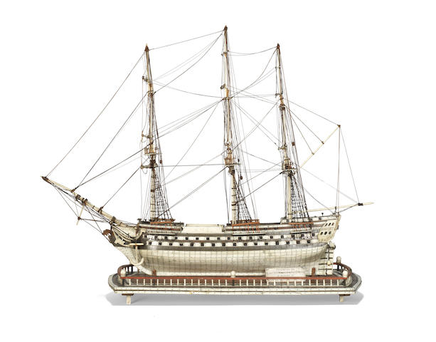 A Napoleonic prisoner-of-war model of the 80-gun ship-of-the-line 'Sans Pariel', early 19th Century,  22 x 28 x 7in (56 x 71 x 18cm). Outer case: 34 x 14 25 1/2in (86 x 35 65cm)
