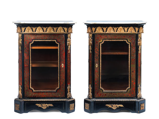 A pair of Napoleon III gilt bronze mounted tortoiseshell and brass 'Boulle' marquetry ebonised pier cabinets (2)