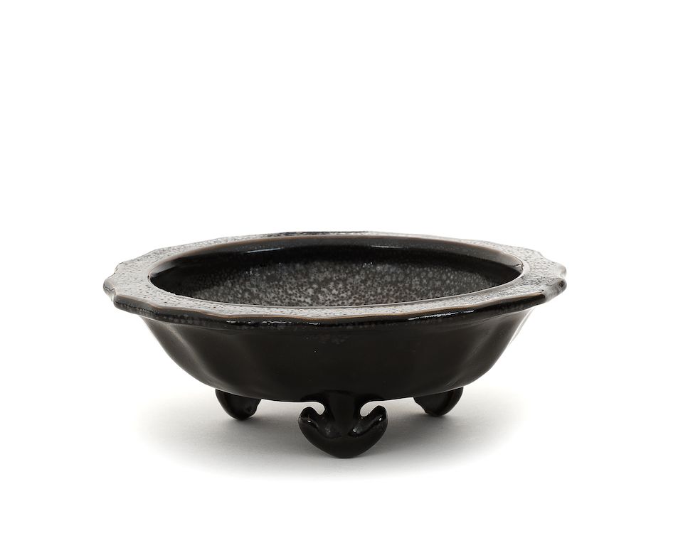 A rare barbed-rim 'oil spot' glazed washer 18th century