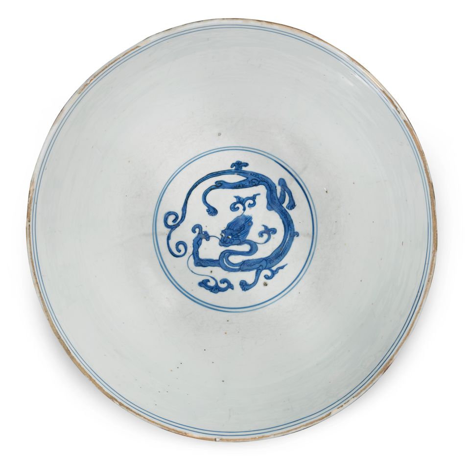 A large blue and white 'nine chilong' bowl Yutang Jiaqi mark, Wanli