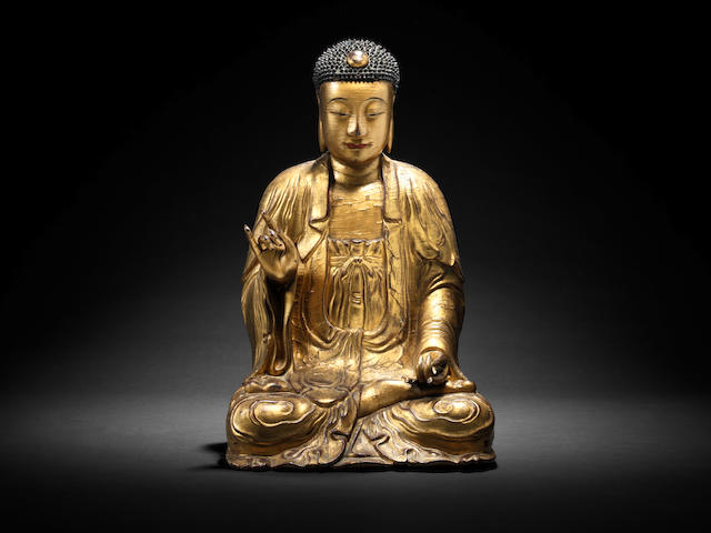 A rare and large gilt-lacquered wood figure of Buddha 17th/18th century