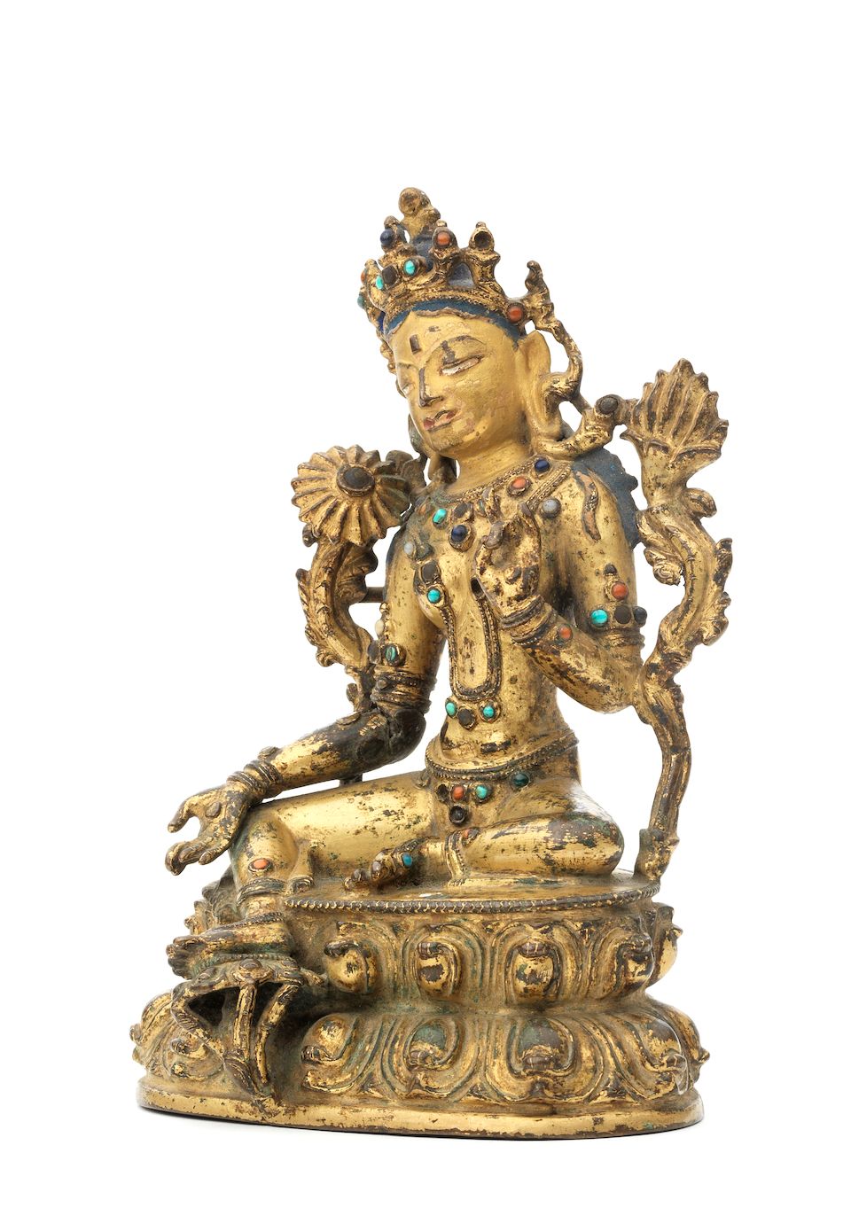 A gilt copper-alloy figure of Syamatara Tibet, 14th/15th century