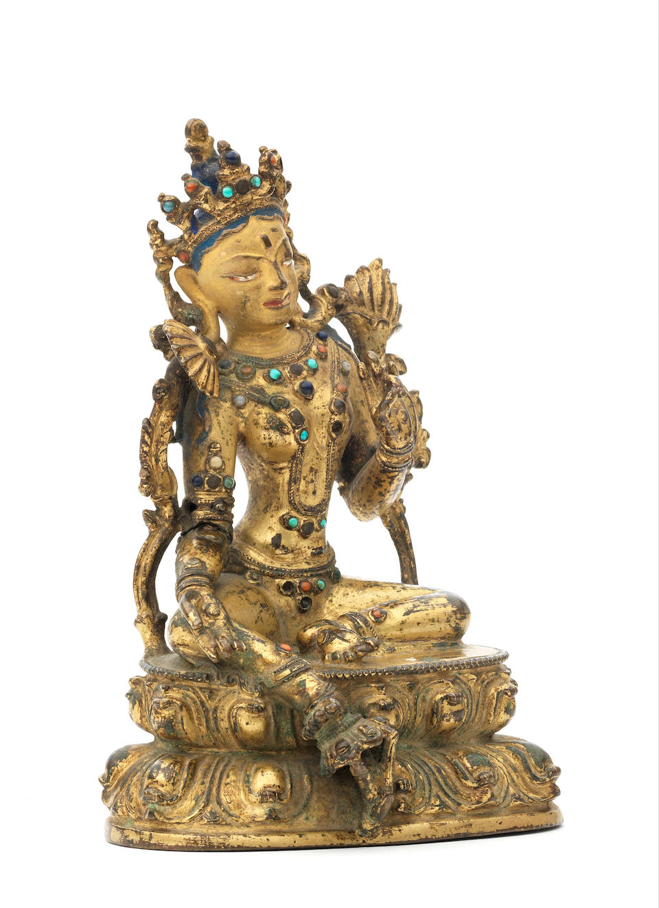 A gilt copper-alloy figure of Syamatara Tibet, 14th/15th century