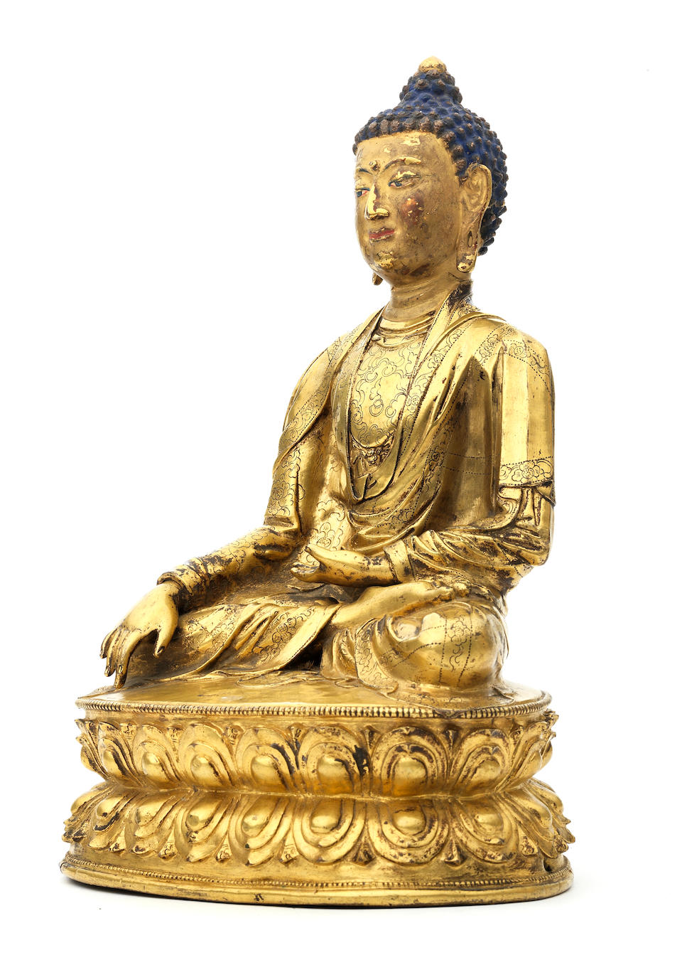 A large and rare gilt copper-alloy figure of Shakyamuni Buddha Tibet, circa 16th century