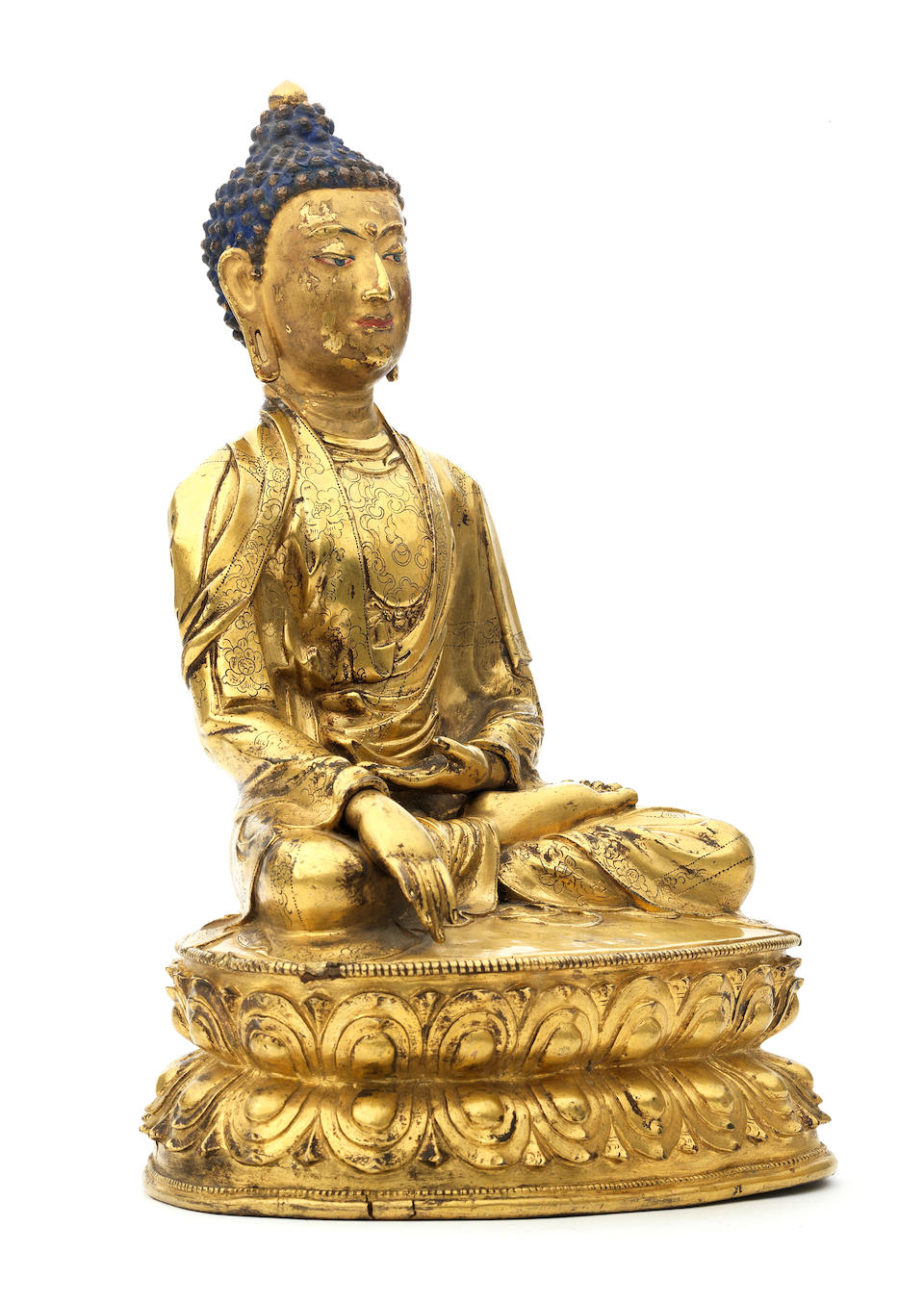 A large and rare gilt copper-alloy figure of Shakyamuni Buddha Tibet, circa 16th century