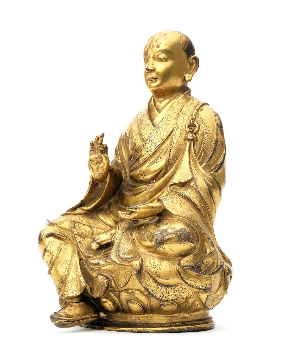 A rare inscribed gilt-copper alloy figure of arhat Bhadra Tibet, 17th century