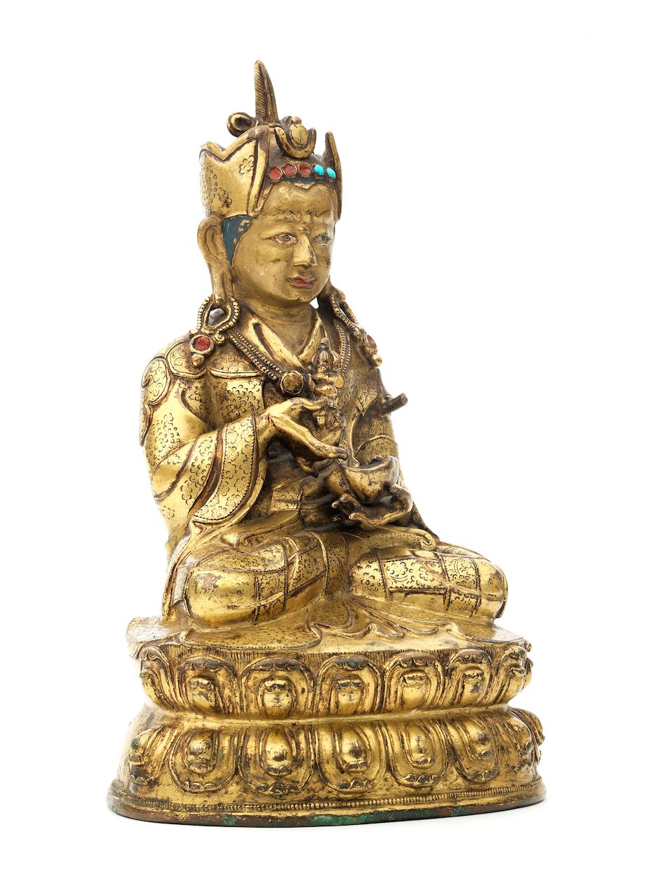 A gilt-copper figure of Padmasambhava Tibet, 17th/18th century