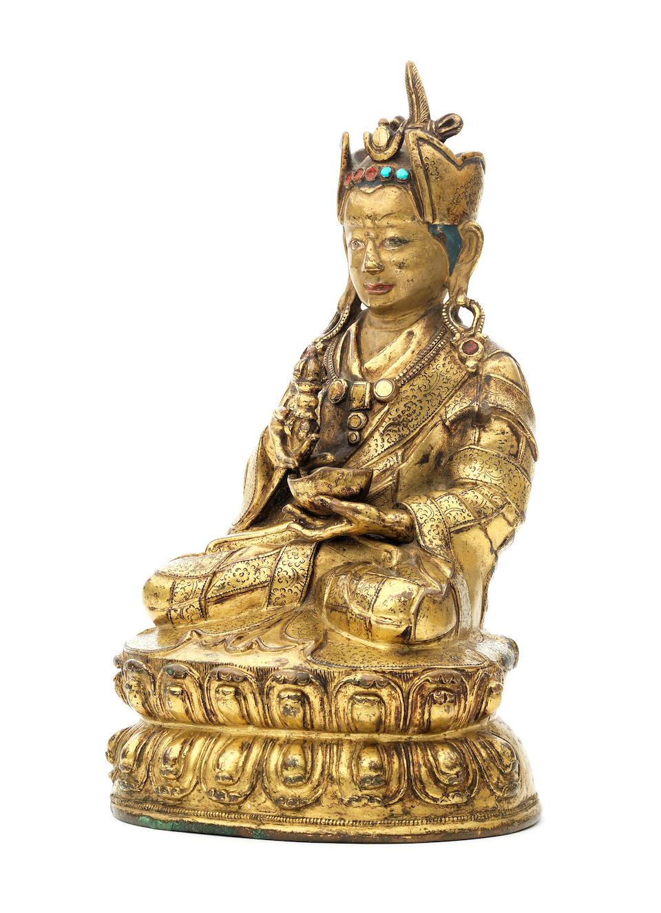 A gilt-copper figure of Padmasambhava Tibet, 17th/18th century
