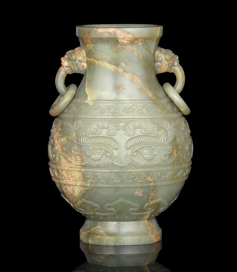 A large archaistic green jade vase, hu Qianlong fang gu mark and of the period