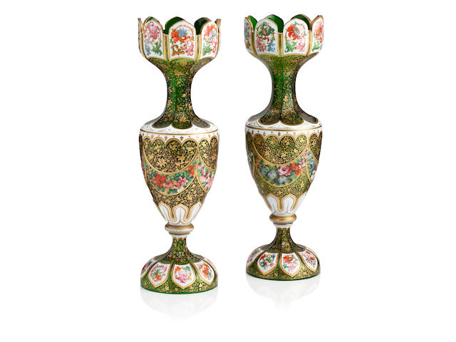 A pair of Bohemian green glass overlay vases Circa 1900