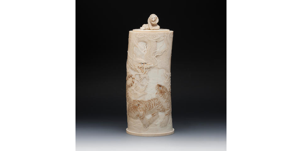 A carved ivory tusk vase and cover  Signed Tomioka, Meiji
