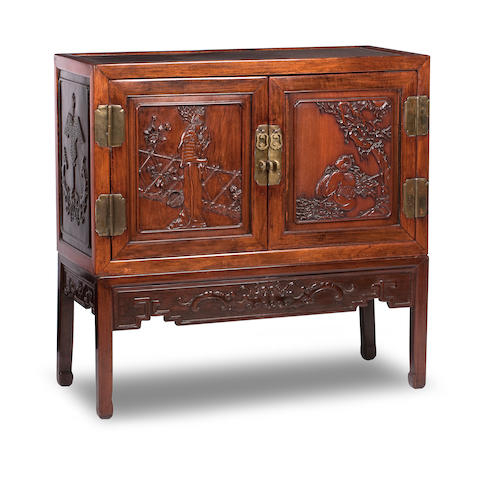A huanghuali side cabinet on stand 19th century