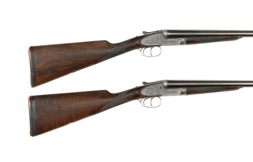 A fine pair of 12-bore self-opening sidelock ejector guns by J. Purdey & Sons, no. 25584/5 In a J. Purdey leather motorcase (latch missing)