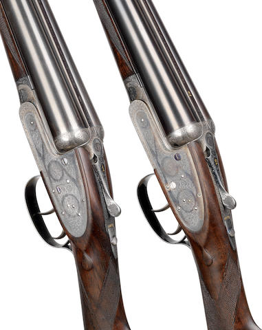 A fine pair of 12-bore self-opening sidelock ejector guns by J. Purdey & Sons, no. 25584/5 In a J. Purdey leather motorcase (latch missing)
