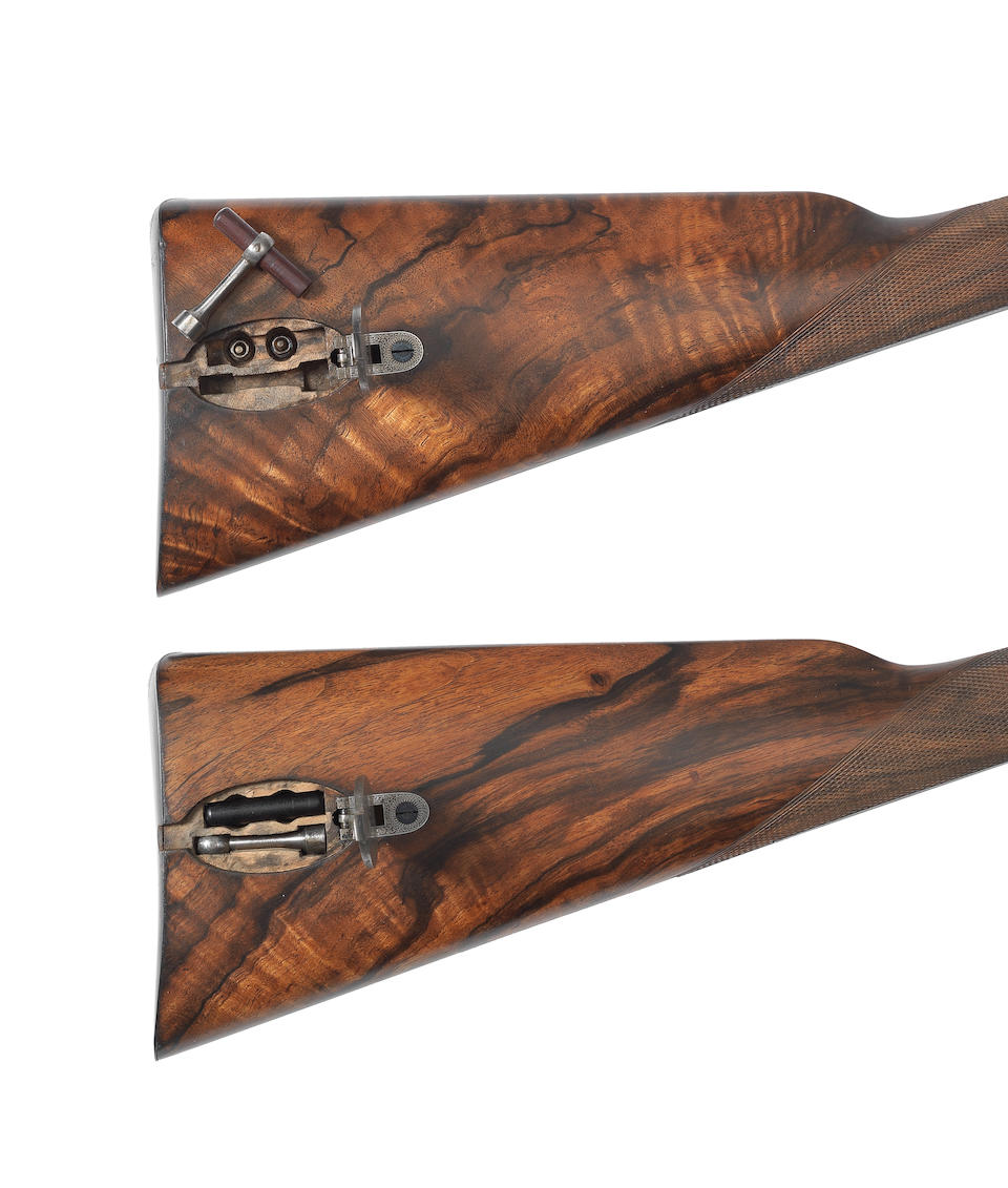 A fine and rare pair of 12-bore bar-in-wood sidelock hammer guns by J. Purdey, no. 7799/7800 In a Purdey leather case