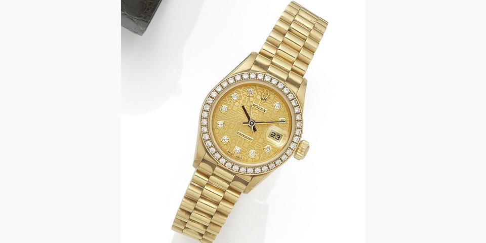 Rolex. A lady's 18K gold and diamond set automatic calendar bracelet watch Datejust, Ref:79138, Serial No.P19****, Movement No.034****, Circa 1999