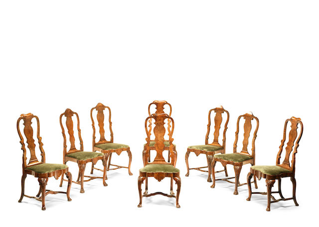 A matched set of eight 18th century Anglo-Dutch walnut veneered dining chairs  (8)