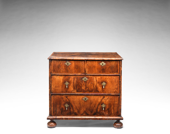 A small William and Mary walnut crossbanded and featherbanded chest image 1