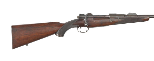 A .350(Magnum) square bridge bolt-magazine take-down rifle by J. Rigby & Co., no. 57885/4664