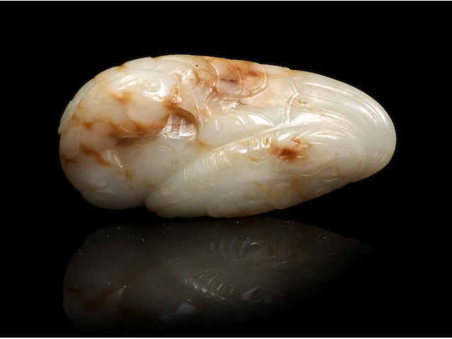 A white and russet jade archaistic phoenix group 17th/18th century