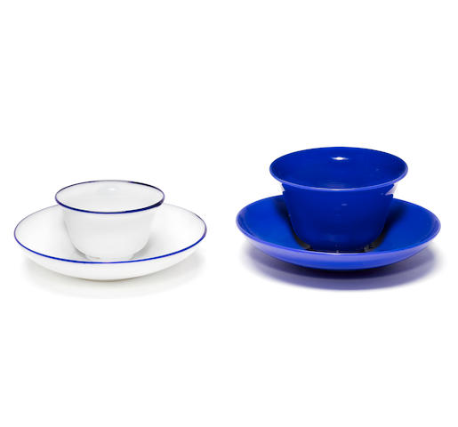 An opaque blue glass teabowl and saucer, possibly Venetian, and a milchglas teabowl and saucer, early 18th century