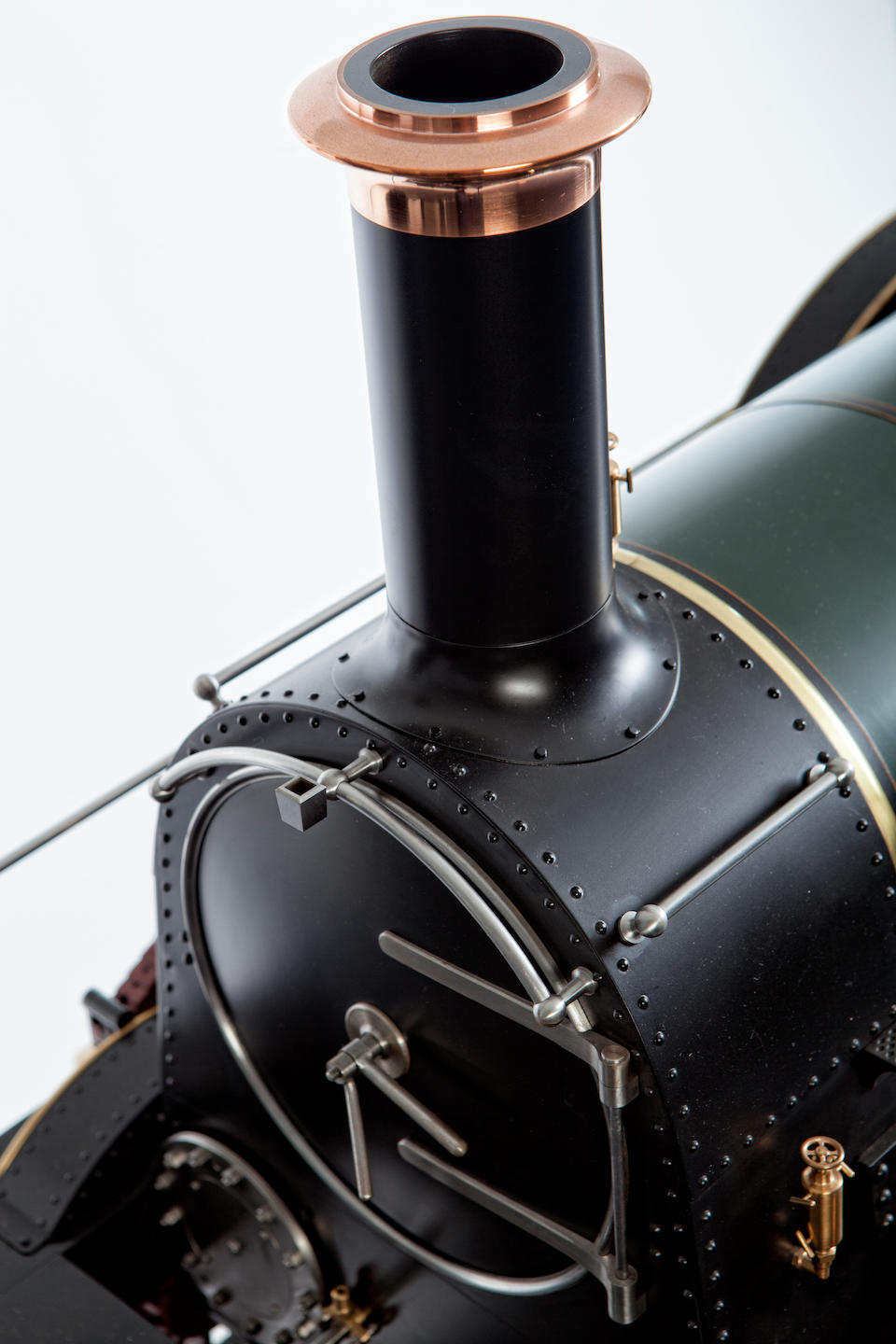 A finely engineered 10 &#188; inch gauge (scale 8.22:1) live steam model of a broad gauge GWR 4-2-2 Rover class Express locomotive 'Dragon', The original designed by Daniel Gooch, model built by Ken Woodham,