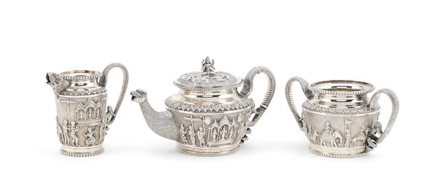 A 19th century Indian three-piece silver tea service by P. Orr & Sons, Madras circa 1880 (30)