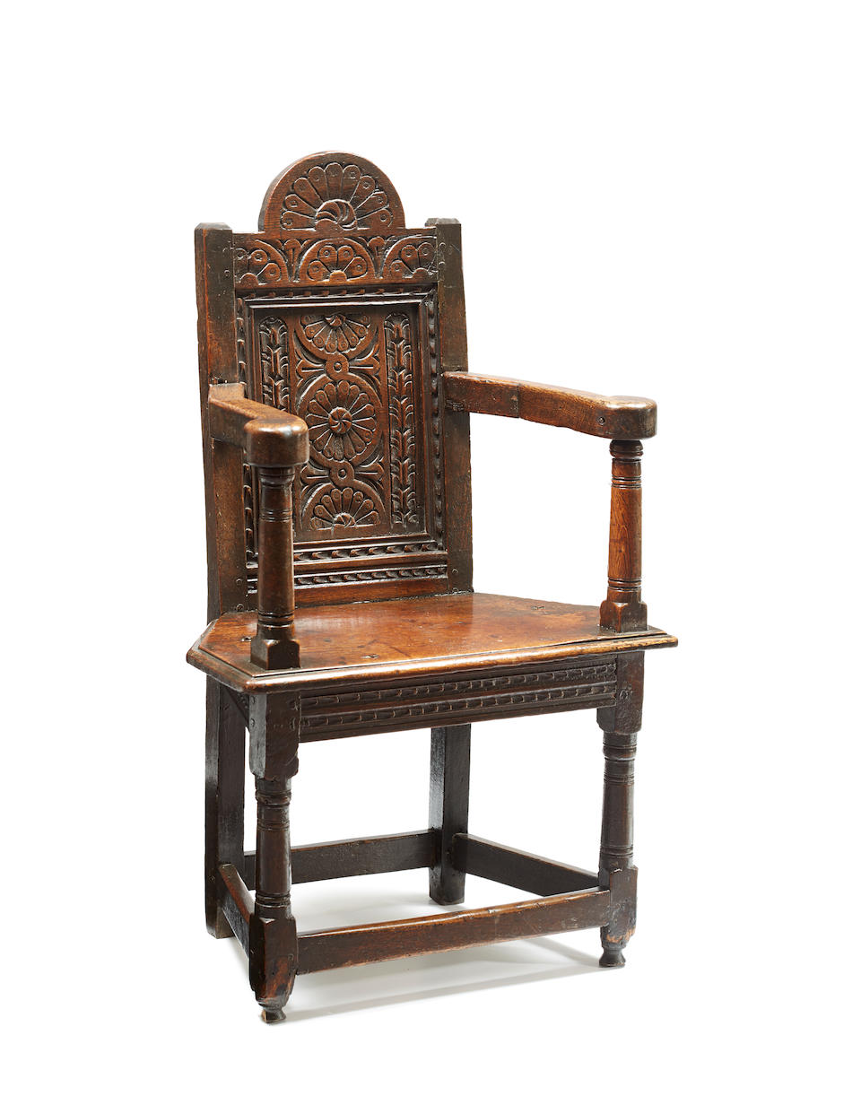 A rare James I joined oak adolescents' caqueteuse armchair, Salisbury, circa 1610 - 20 In the manner of the acclaimed Humphrey Beckham workshop