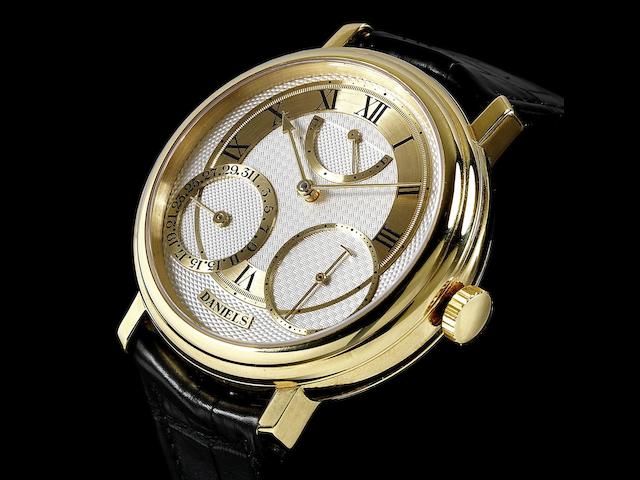 George Daniels. A very rare and fine 18K gold limited series manual wind instantaneous calendar wristwatch with power reserve indication, co-axial escapement and start stop mechanism, Daniels Anniversary Edition, No.24/35