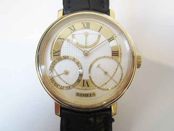 George Daniels. A very rare and fine 18K gold limited series manual wind instantaneous calendar wristwatch with power reserve indication, co-axial escapement and start stop mechanism, Daniels Anniversary Edition, No.24/35 image 6