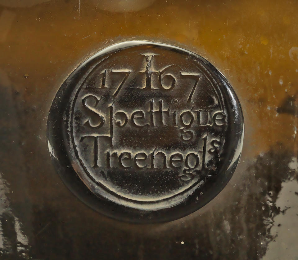 A sealed wine bottle for John Spettigue, dated 1767