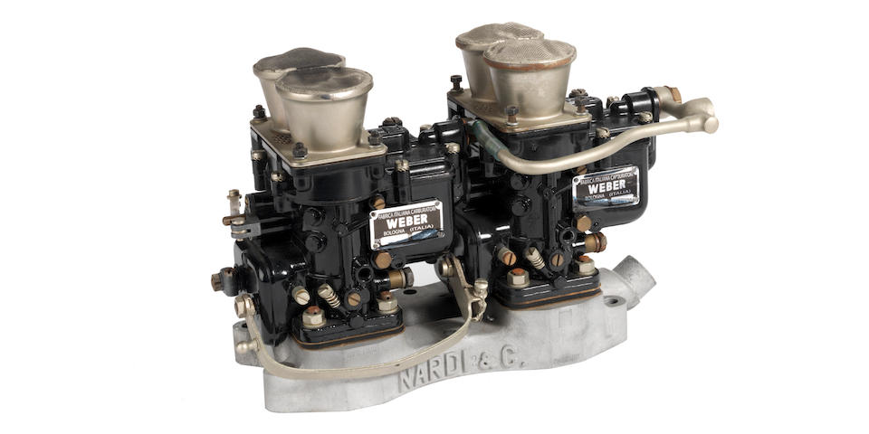 A pair of Weber 40DCL 5 carburettors on a Nardi manifold,