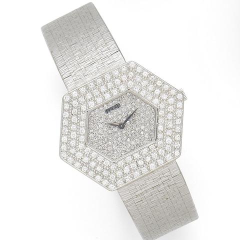 Piaget. An 18K white gold and diamond set manual wind hexagonal bracelet watch Ref:99055A6, Case No.2 85609, Circa 1990