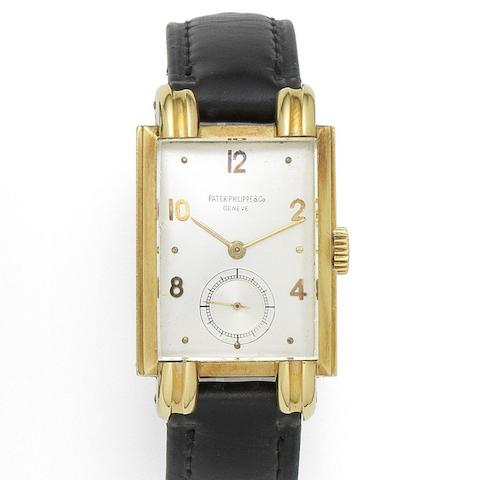 Patek Philippe. An 18K gold manual wind rectangular wristwatch Ref:1480, Case No.509852, Movement No.838697, Manufactured in 1946, Sold 28th February 1947