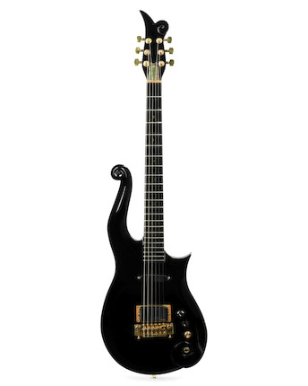Prince a custom-made Cloud guitar in black finish, numbered 4, taken on the Act I & II, Prince and the New Power Generation tours, 1993, image 1